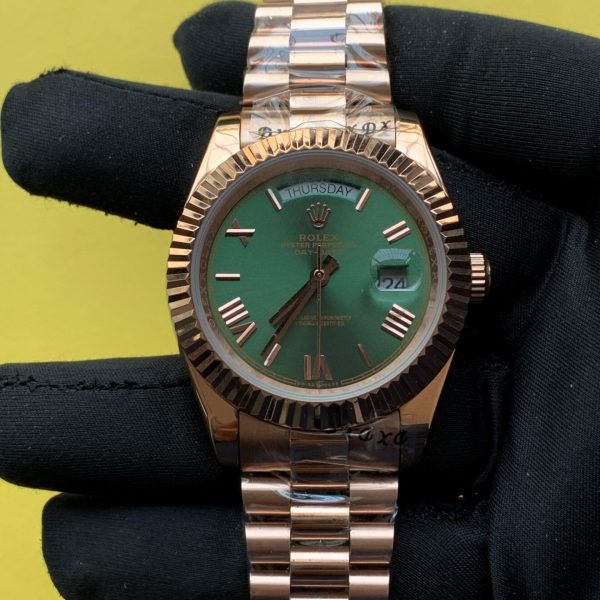 Rolex Day-Date 40MM Green Roman Dial fluted bezel 228235